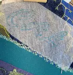 How do you embroider letters by hand on a crazy quilt block. The tutorial covers how to position your letters and the three stitches used.  