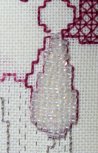 Seed beads used as an earring for this 1920's lady Seed beads used for an earring