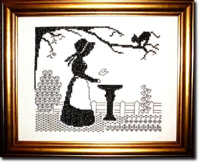 Victorian garden blackwork by a birdbath; lady with companion and cat on a branch — ‘Mischief in the Air’ pattern