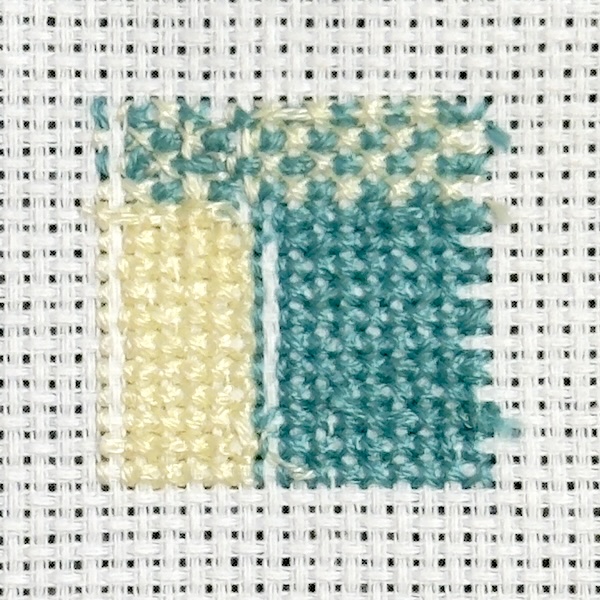 the back of the reversible cross stitch example the back of the reversible cross stitch example