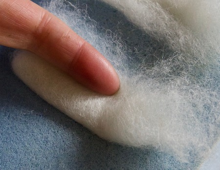 stabbing the felted bunny ears