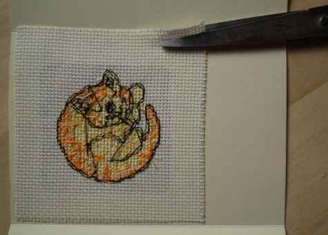 Trimming the fabric to size Trimming the fabric to size