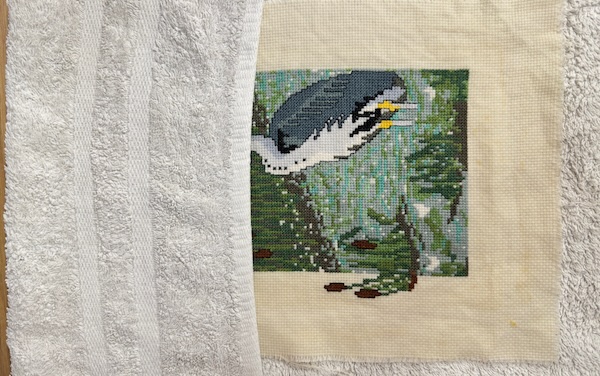 Lay on towel and roll up