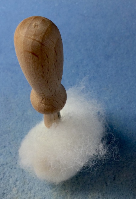 Ball of wool ready to needle felt Ball of wool ready to needle felt