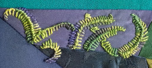 Ferns stitched with barb stitch showing fern-like leaves