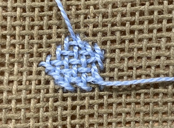 The woven look on the reverse of basketweave stitch