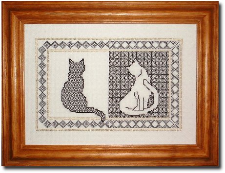 Pretty cat needle case with blackwork and Assisi motifs
