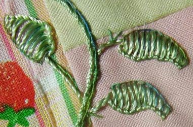 Blanket stitch leaves with backstitch detail