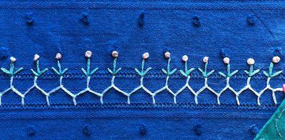 Flowers stitched with Colonial knots