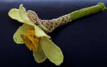 Completed needlelace daffodil with stem and sepal