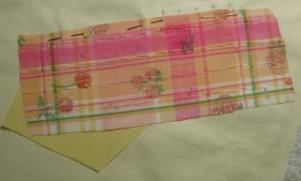 Adding the strawberry fabric piece to the block