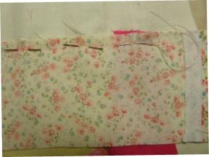 Pinning the next fabric piece in place