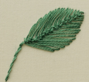 Cretan stitch filling a leaf shape with a natural raised vein