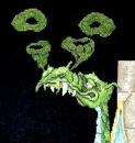 Close-up of Old Smokey dragon design showing smoke rings worked in half cross stitch