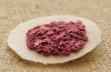 Embroidered slip with excess fabric trimmed away