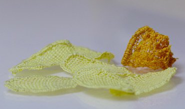 All needlelace daffodil pieces laid out before assembly