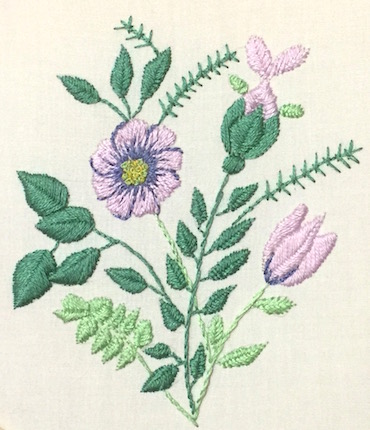 Fishbone stitch floral design with central vein detail