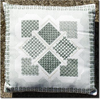 Blackwork Garden Sampler in green and gold, with knot-garden paths and beds
