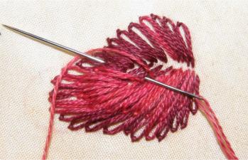 Building up the strawberry with a second layer of lighter stitches