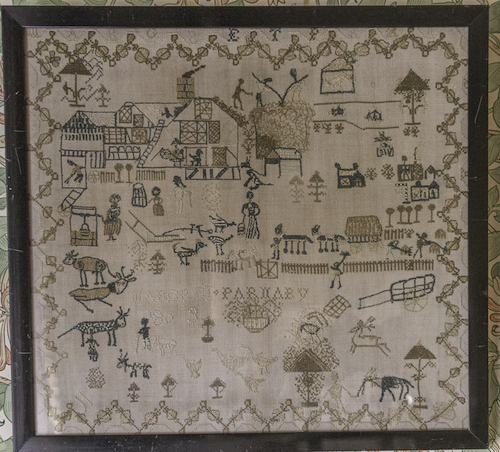 Margaret Parnaby's 1809 farmyard sampler in the Nursery at Wallington