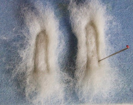 Creating felted ear shapes for the bunny