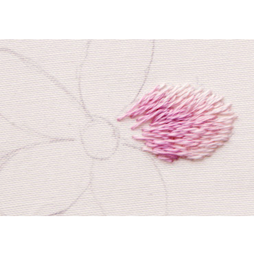 The petal after three colours of thread have been used