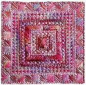 Anne's Infinity needlepoint square stitched with alternating shiny rayon and matte cotton threads creating rich texture contrast in the Scotch stitch borders