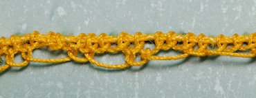 The first pattern row of pea stitch on the trumpet