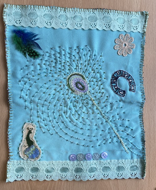 Slow stitching on a peacock theme