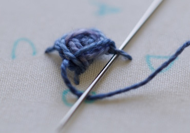 Step 6: the raised stitch building up, shown partially from the side