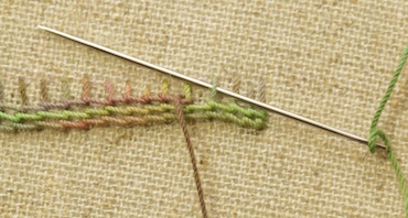 Laying the foundation stitches for a raised stem band