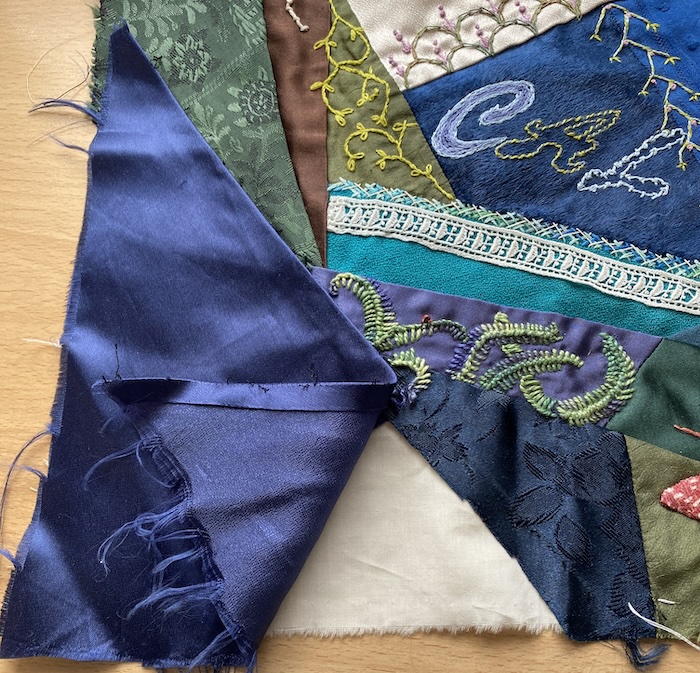 Unpicking the problem patch from the crazy quilt block