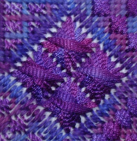 Needlepoint design Hope showing purple Rhodes stitches worked in ribbon