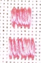 Photograph showing the difference using a laying tool can make to straight stitches