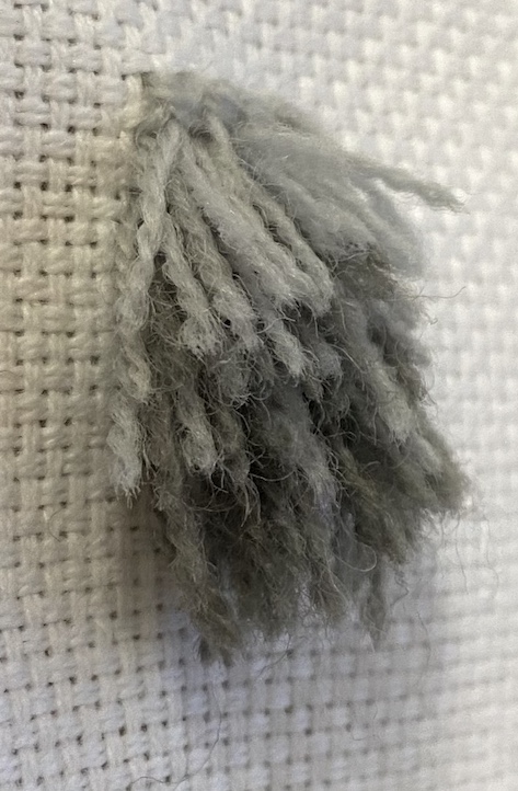 Velvet stitch on Hardanger fabric with shaded grey wool