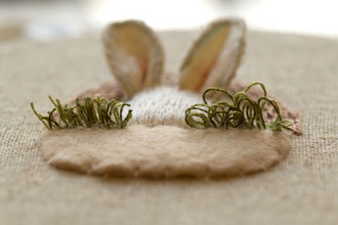 Velvet stitch grass showing cut loops on the left and uncut on the right