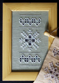 Wish Upon a Star hardanger bellpull with a single star and rows of four-sided stitch